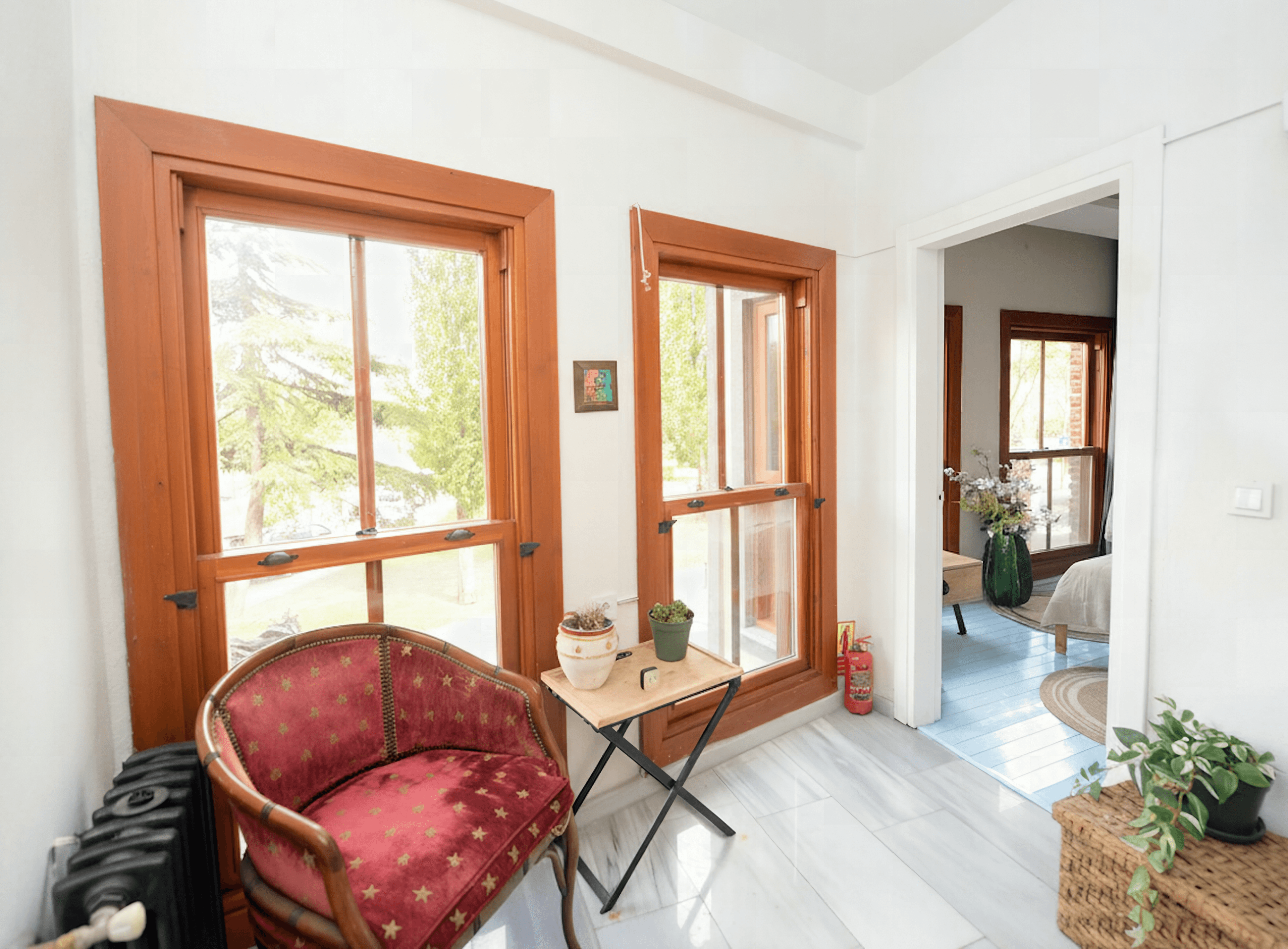 Charming entryway with velvet armchair